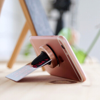Univerzálny magnetický držiak do auta na uchytenie do ventilačné mriežky ružový